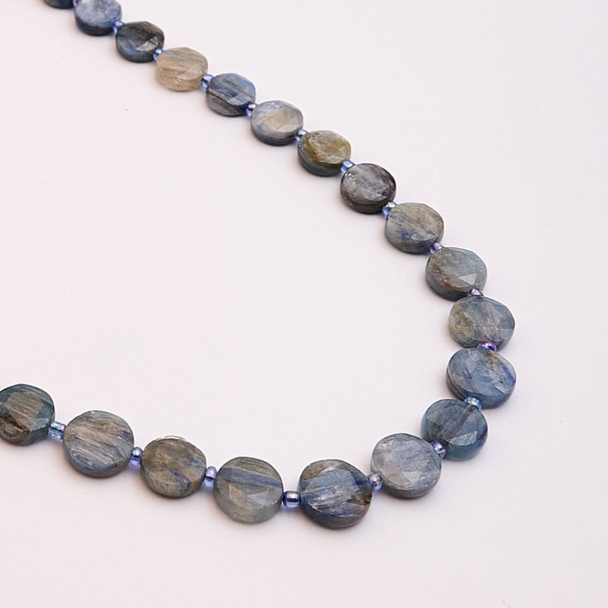 Multicolor Kyanite, natural, B quality, faceted, puffed disc bead, 37-39 cm/string, 12 mm Multicolor Kyanite, natural, B quality, faceted, puffed disc bead, 37-39 cm/string, 12 mm