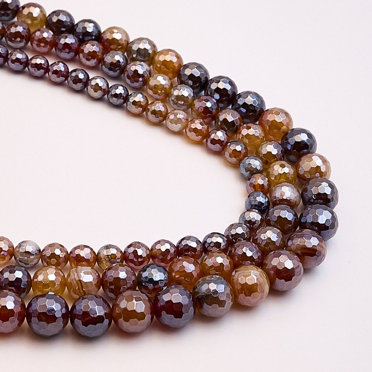 Striped agate, natural, A grade, dyed, faceted, shiny, AB effect, round shape, 37–39 cm/strand, 10 mm Striped agate, natural, A grade, dyed, faceted, shiny, AB effect, round shape, 37–39 cm/strand, 10 mm