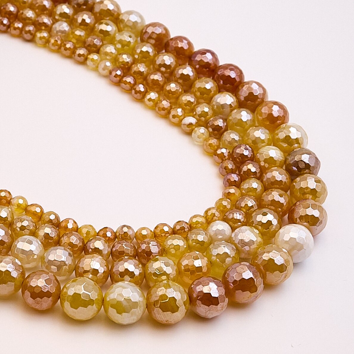 Striped agate, natural, A grade, dyed, faceted, shiny, AB effect, round shape, 37–39 cm/strand, 12 mm Striped agate, natural, A grade, dyed, faceted, shiny, AB effect, round shape, 37–39 cm/strand, 12 mm