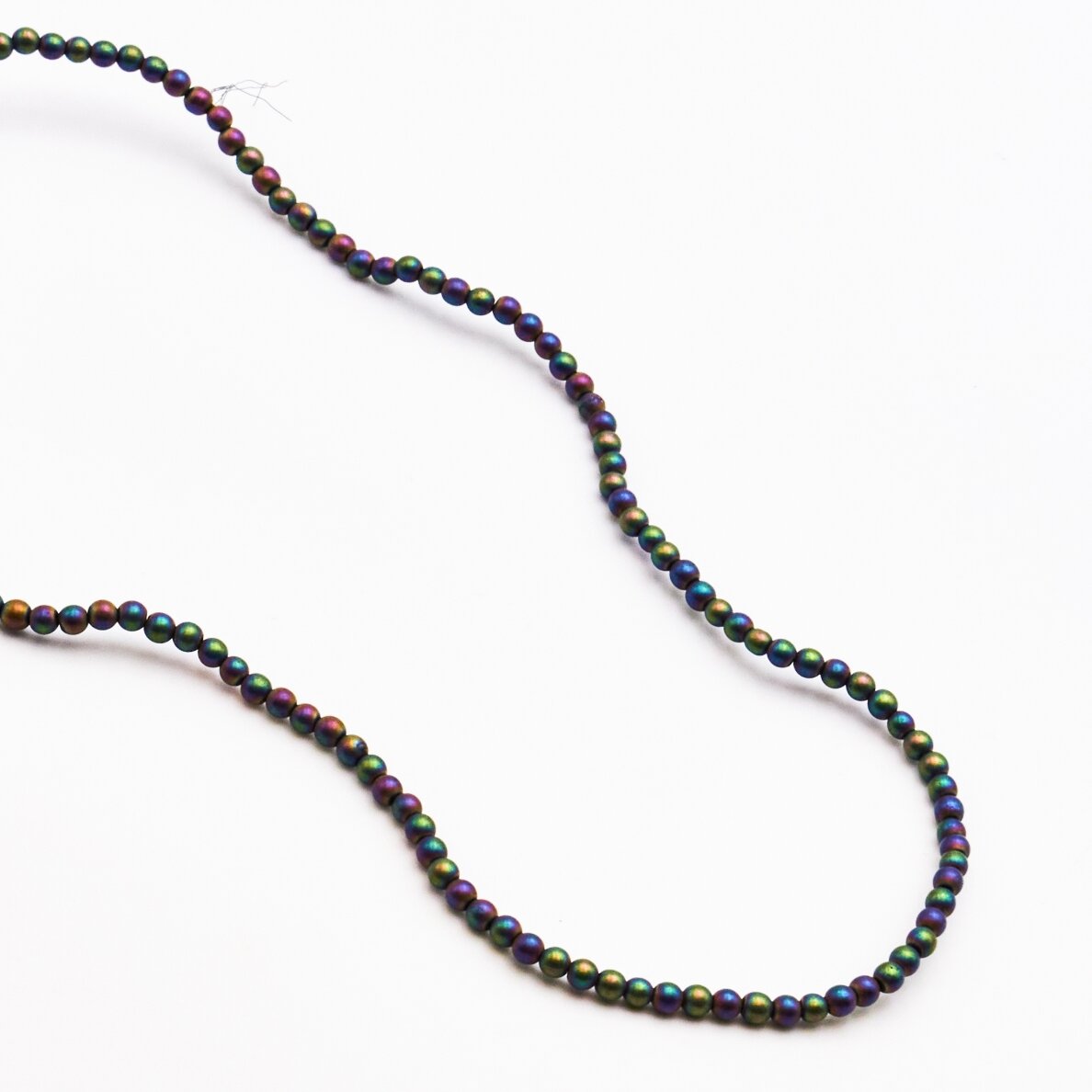 Hematitas, regeneruotas, matinis, apvali forma, įvairiaspalvis, 39-40 cm/gija, 1.5 mm