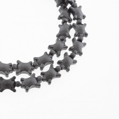 Hematitas, regeneruotas, matinis, vėžlio forma, juoda spalva, 39-40 cm/gija, 10x14 mm Hematitas, regeneruotas, matinis, vėžlio forma, juoda spalva, 39-40 cm/gija, 10x14 mm