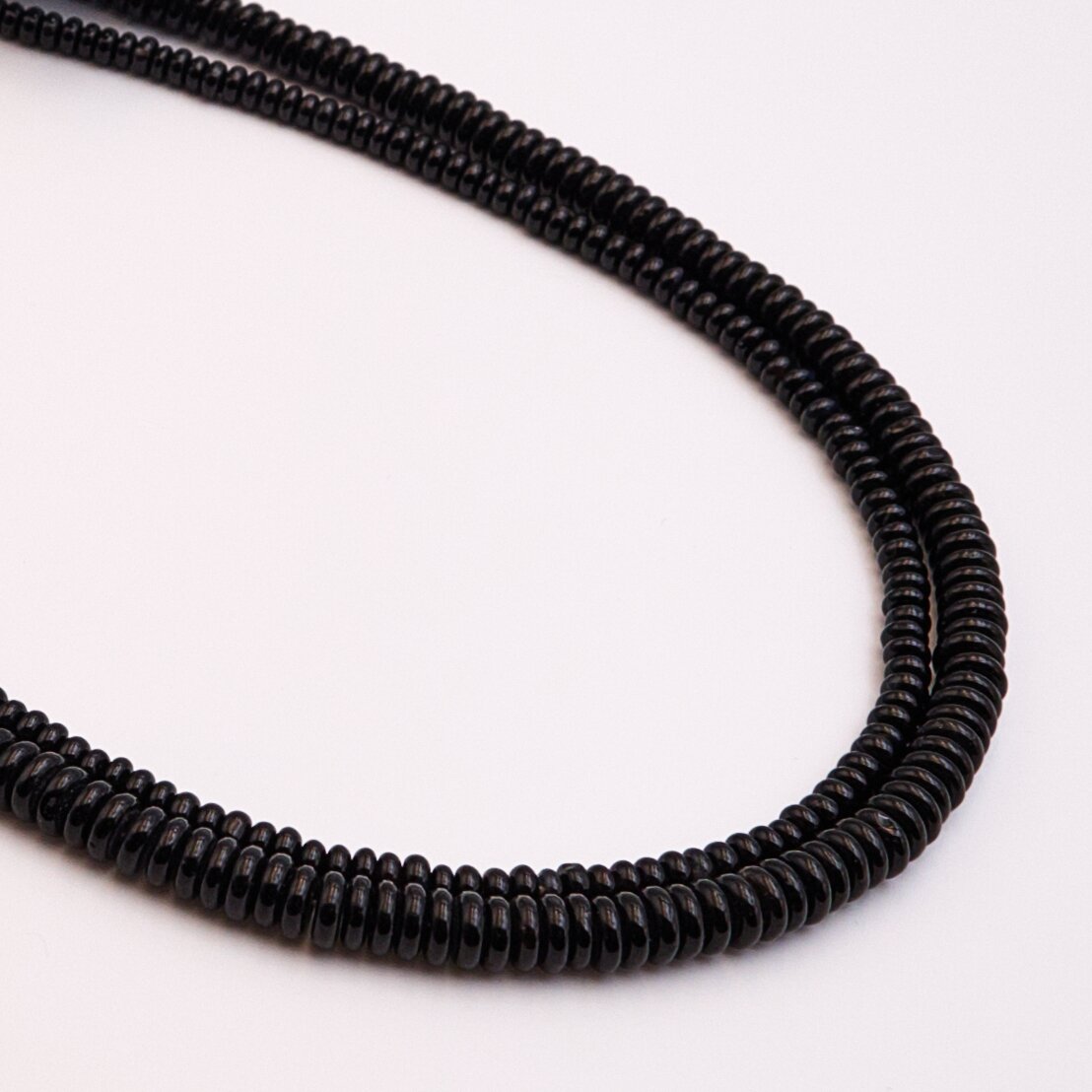 Black Onyx, natural, AB quality, abacus rondelle shape, 37–39 cm/strand, 2x6 mm Black Onyx, natural, AB quality, abacus rondelle shape, 37–39 cm/strand, 2x6 mm