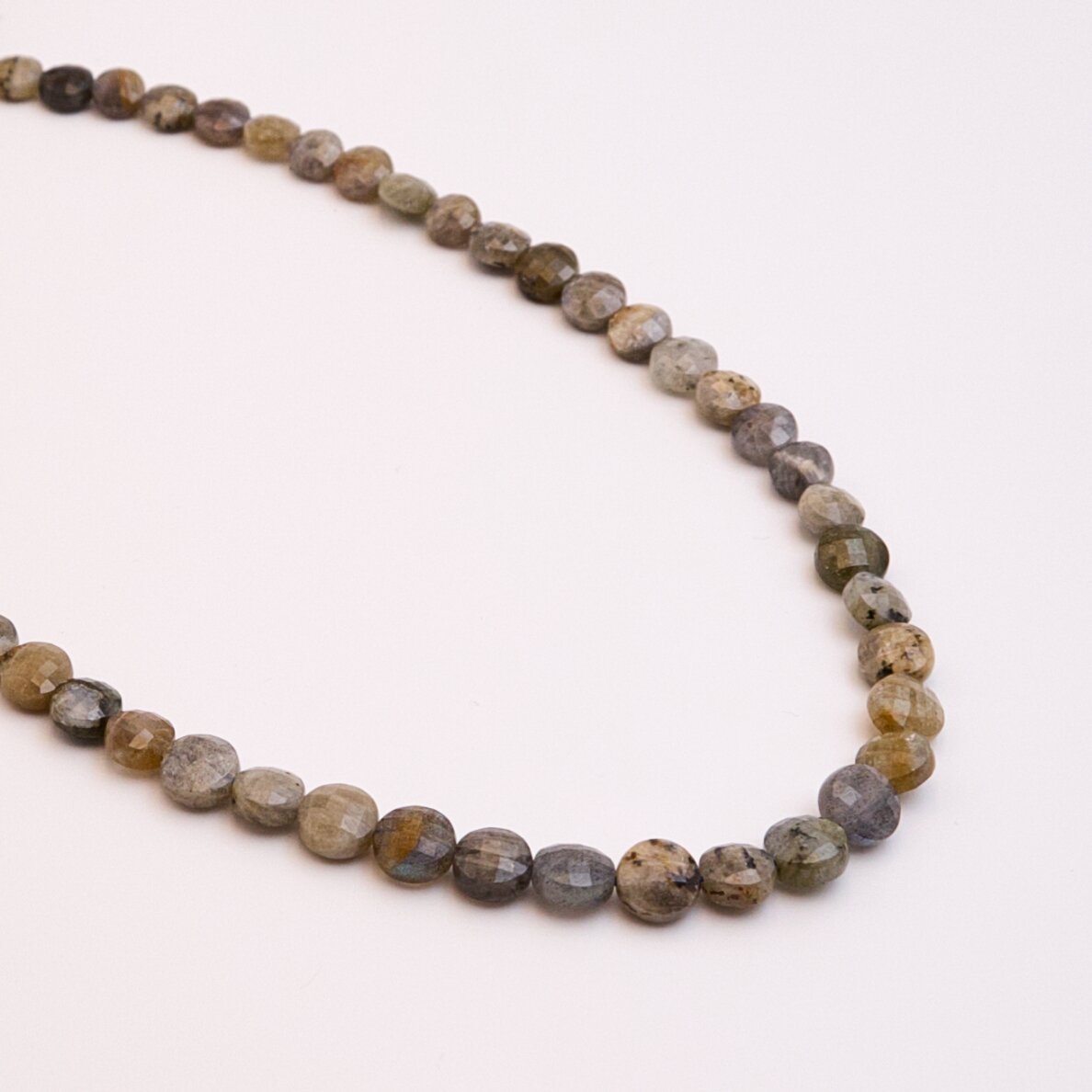 Labradorite, natural, B quality, faceted, puffed disc bead, 37-39 cm/string, 8 mm Labradorite, natural, B quality, faceted, puffed disc bead, 37-39 cm/string, 8 mm