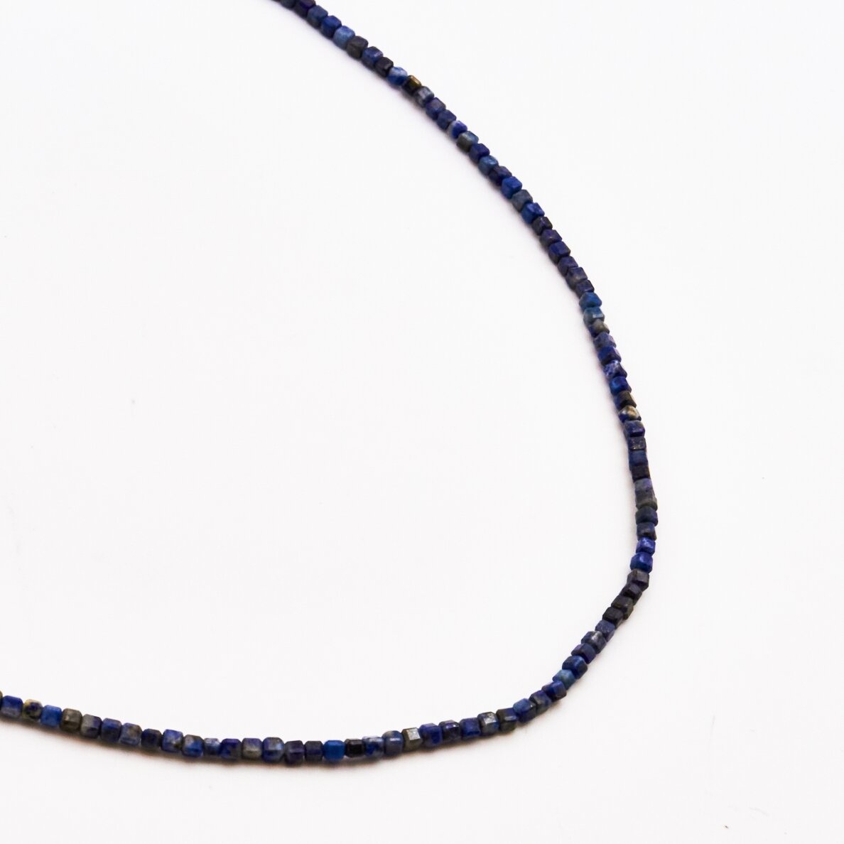 Lapis Lazuli, natural, AB quality, faceted, cube bead, 37-39 cm/string, 2 mm Lapis Lazuli, natural, AB quality, faceted, cube bead, 37-39 cm/string, 2 mm