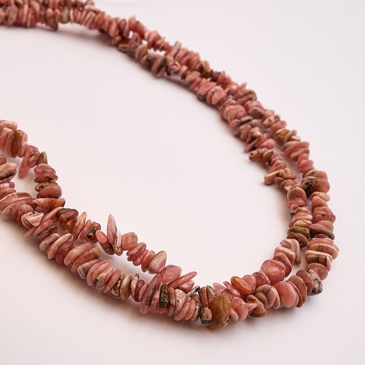 Rhodochrosite, chip bead, about 80–83 cm/strand