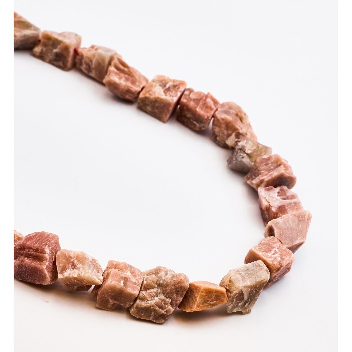 Sunstone, 39-40cm/strand, about 12x20–18x25 mm