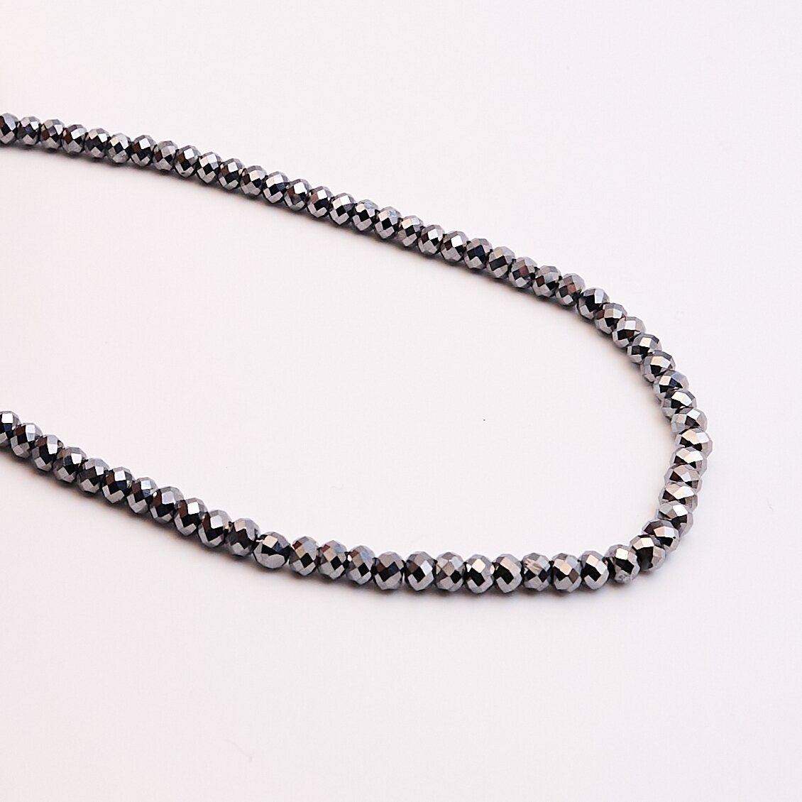 Terahertz Stone, natural, A quality, faceted, abacus rondelle bead, 37-39 cm/string, 6x4 mm Terahertz Stone, natural, A quality, faceted, abacus rondelle bead, 37-39 cm/string, 6x4 mm