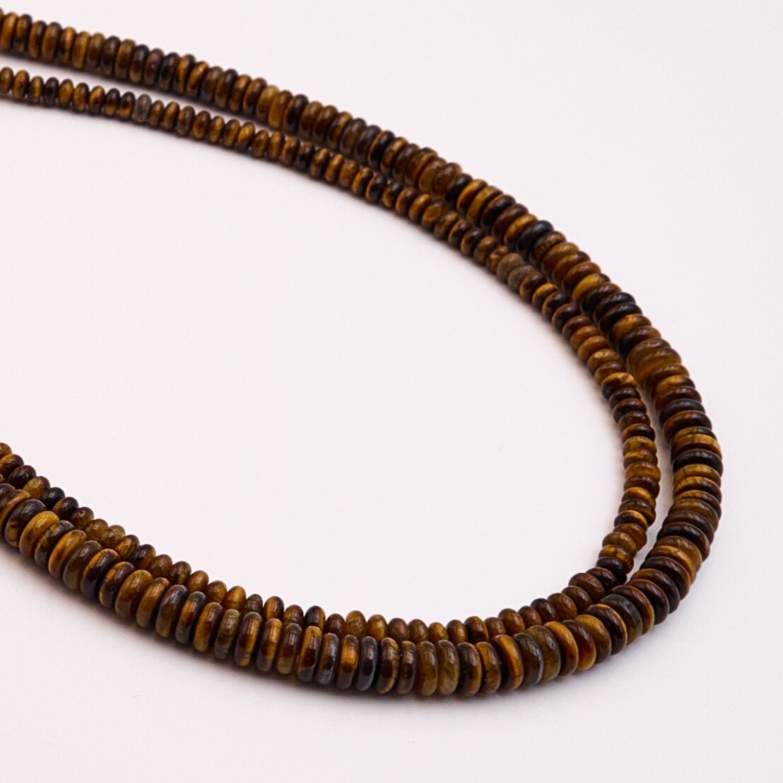 Tigro akis, natūralus, AB kokybė, abacus rondelės forma, 37-39 cm/gija, 2x6 mm Tigro akis, natūralus, AB kokybė, abacus rondelės forma, 37-39 cm/gija, 2x6 mm