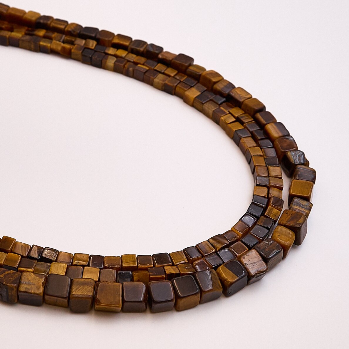 Tiger’s Eye, natural, B quality, cube shape, 37-39 cm/strand, 8x8 mm
