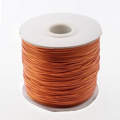 Vaškuota poliesterinė virvelė, #40 gintaro spalva, apie 180 metrų/ritė, 0.5 mm Vaškuota poliesterinė virvelė, #40 gintaro spalva, apie 180 metrų/ritė, 0.5 mm
