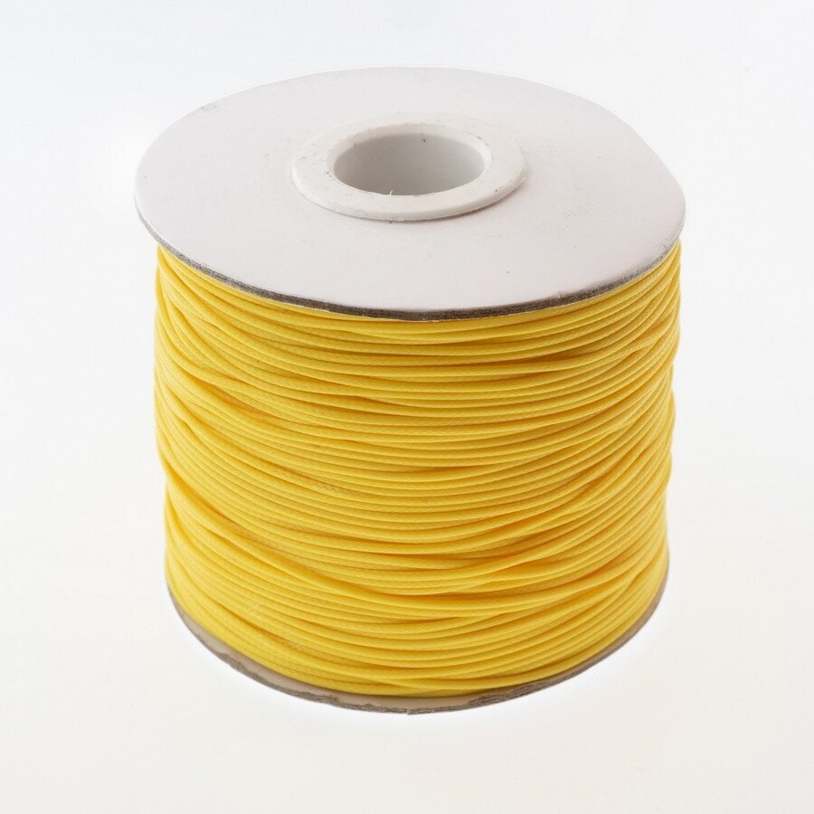 Vaškuota poliesterinė virvelė, #02 geltona spalva, apie 180 metrų/ritė, 1.0 mm